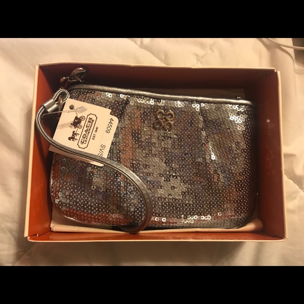 Brand new silver sequins coach wristlet